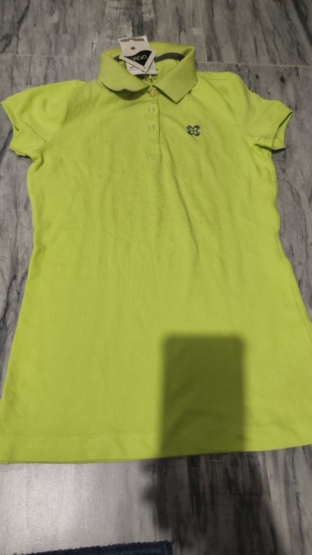 Giordano Polo Shirt - Size S (Category: Shirts) located in Cavite. Submitted by nesstuffandeverything (Listing ID 1408710709, Image 1). Description: - Giordano polo shirt - Bright green color - Size: S - Classic polo collar - Short sleeves - Small logo on chest - Button-up placket - Made with Lycra fabric - Brand new with original tags minimal flaws po since nastock sa cabinet.