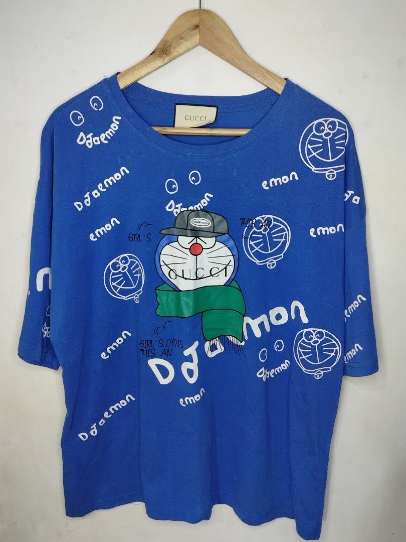 Gucci Doraemon Teeshirt (Category: Tshirts & Polo Shirts ) located in Tacurong. Submitted by jumarvelous (Listing ID 1408787050, Image 1). Description: Excellent Condition No Issue size XL on tag, best fit XL Dimes: 23x27 Condition: 9/10.