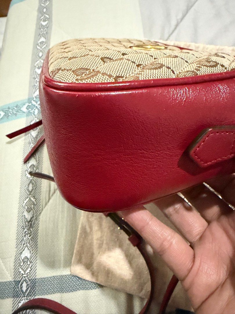 Gucci Marmont Camera Bag (Category: Luxury Bags & Wallets) located in Taguig. Submitted by Zyannah (Listing ID 1408703527, Image 3). Description: Preloved authentic Gucci Marmonr Camera Bag. With dustbag and card. No issues or major flaws to declare. Well loved and personally pre-owned. Country of origin: Italy Date / authenticity code: 447632 520981 Measurements: 9.5”L x 2.5”W x 6.5”H Exterior pockets: N/A Interior pockets: One open pocket Handl