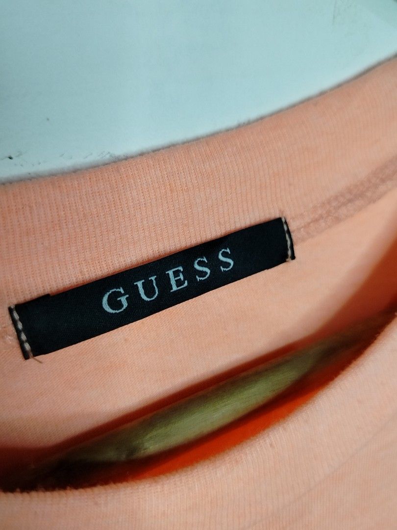 Guess Teeshirt (Category: Tshirts & Polo Shirts ) located in Tacurong. Submitted by jumarvelous (Listing ID 1408793368, Image 2). Description: Excellent Condition Washable stain size M on tag, best fit M Dimes: 21x27 Condition: 10/10.