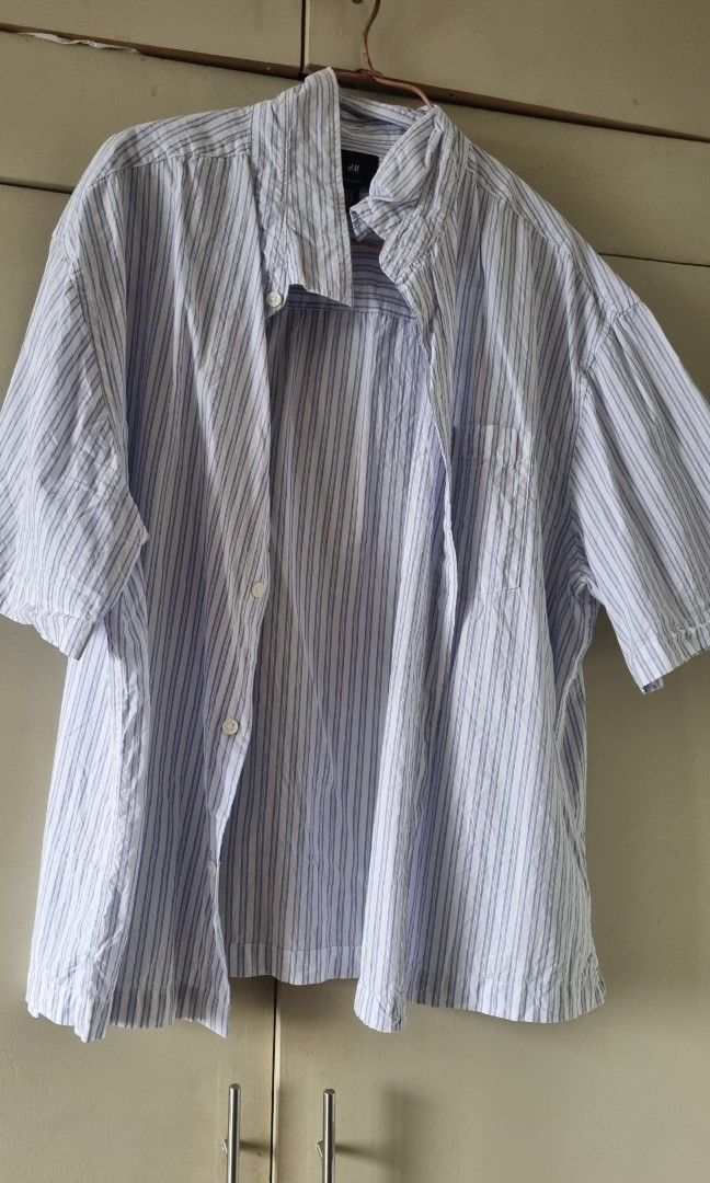 H&M Regular Fit Striped Shirt - XL (Category: Tshirts & Polo Shirts ) located in Manila. Submitted by cssunriseph (Listing ID 1408748554, Image 2). Description: - H&M Regular Fit Shirt - Size: XL - Features: Striped pattern - Fit: Regular - Tag Size Equivalents: EUR XL, US XL, CA TG, MX XG, CN 180/116A Only used once No issue, gusot lang Rfs: di pala kasya sa magsusuot 🥹.