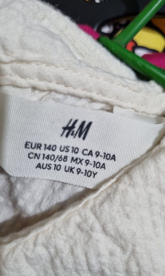 H&M white dress (Category: Babies & Kids Fashion) located in Manila. Submitted by cssunriseph (Listing ID 1408750327, Image 2). Description: fits 8-10yo no issue.