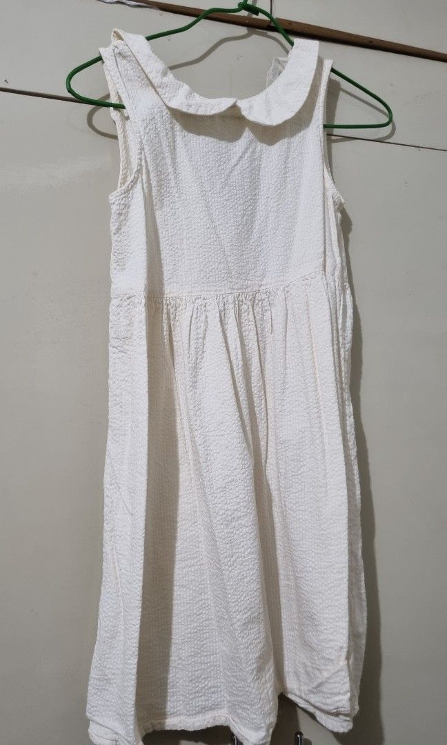 H&M white dress (Category: Babies & Kids Fashion) located in Manila. Submitted by cssunriseph (Listing ID 1408750327, Image 1). Description: fits 8-10yo no issue.