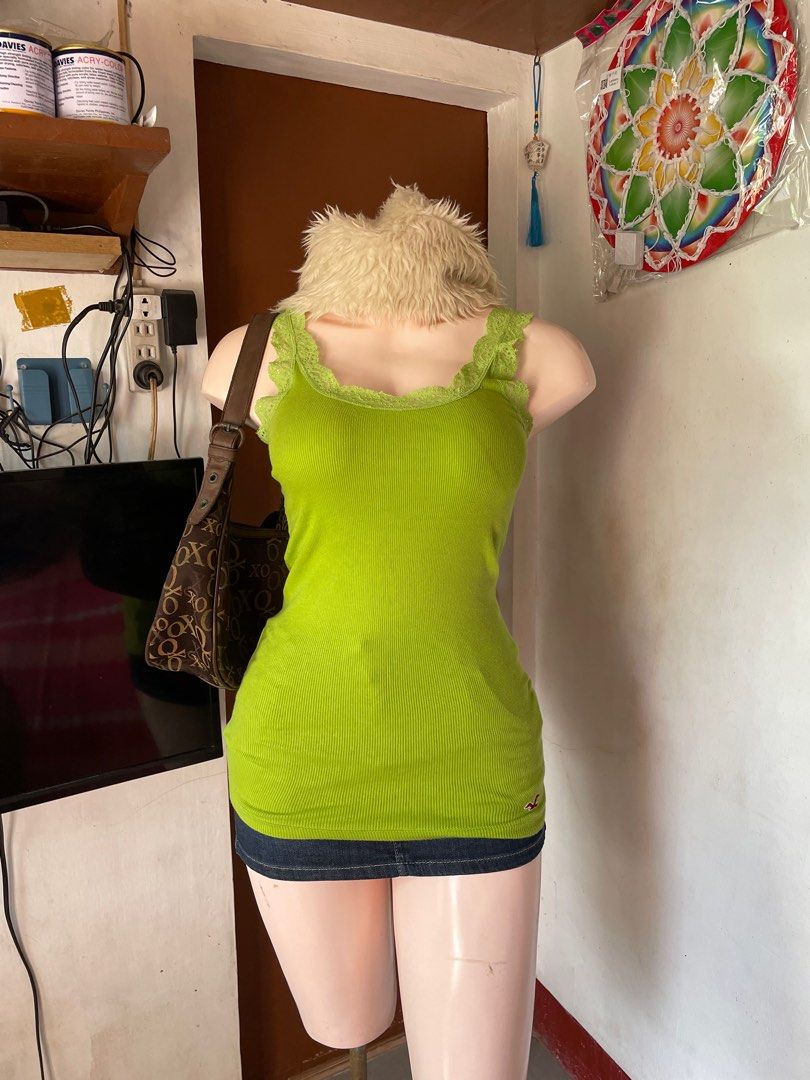 Hollister Green Tank Top (Category: Sleeveless) located in Tabaco. Submitted by bilys_aura (Listing ID 1408870807, Image 1). Description: ୨ৎ green hollister top — size: s-med — 10/10 condition — no flaws! mine: 350 ❌ via ig steal: 450 bid +50 increment lock: 600 (au) eob: dec 10 | 11 pm.