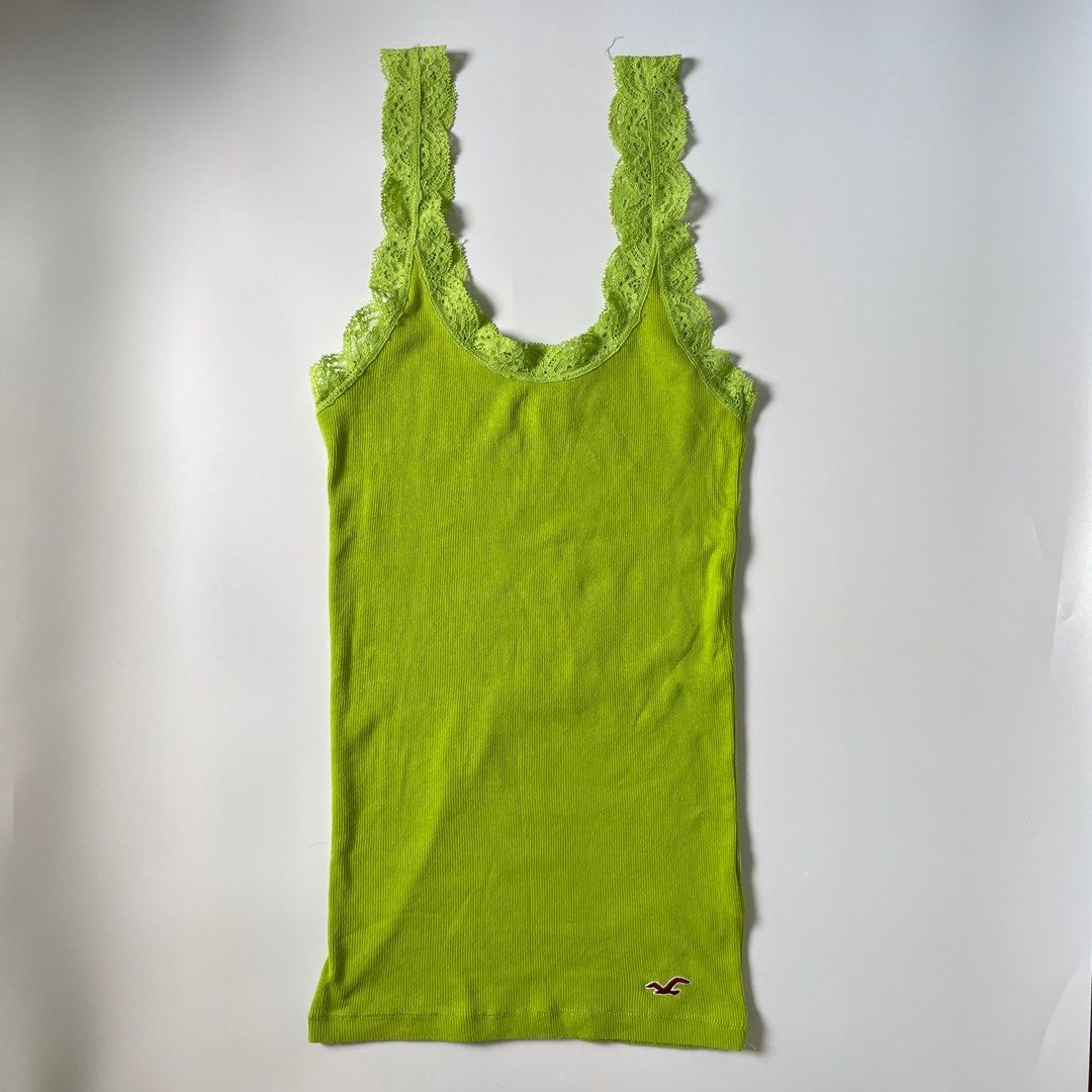 Hollister Green Tank Top (Category: Sleeveless) located in Tabaco. Submitted by bilys_aura (Listing ID 1408870807, Image 2). Description: ୨ৎ green hollister top — size: s-med — 10/10 condition — no flaws! mine: 350 ❌ via ig steal: 450 bid +50 increment lock: 600 (au) eob: dec 10 | 11 pm.