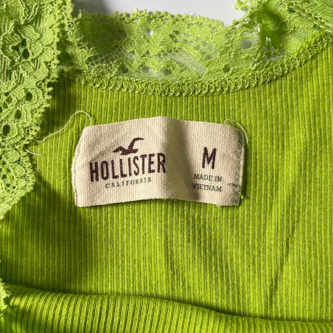 Hollister Green Tank Top (Category: Sleeveless) located in Tabaco. Submitted by bilys_aura (Listing ID 1408870807, Image 3). Description: ୨ৎ green hollister top — size: s-med — 10/10 condition — no flaws! mine: 350 ❌ via ig steal: 450 bid +50 increment lock: 600 (au) eob: dec 10 | 11 pm.