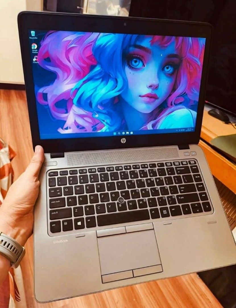 HP EliteBook Laptop (Category: Laptops & Notebooks) located in Quezon City. Submitted by gadgetsun (Listing ID 1408708189, Image 2). Description: - HP EliteBook laptop - Silver finish - Full keyboard and touchpad - Webcam included - Good working condition - Colorful display ***HP EliteBook 745 G2: Ready for use. Features an AMD A8 PRO 2.20GHz Quad-Core CPU, 4GB RAM, 128GB SSD, 14-inch LED display, webcam, Wi-Fi capabilities, and 3D functionality.