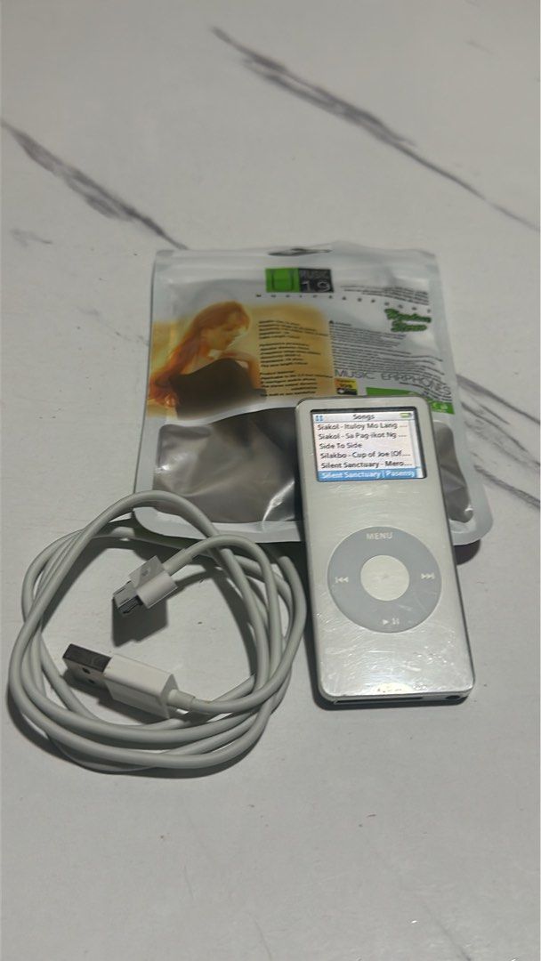 iPod Nano 1st Generation (Collector's Edition) (Category: Other Gadgets) located in Manila. Submitted by yezdeal2017 (Listing ID 1408831056, Image 1). Description: 📌 iPod Nano 1st Gen 2GB – White | ₱1,999 Classic Apple music player with pre-loaded songs 🎶 Prices; 70% ₱1999 85% ₱2499 95% ₱2999 Iconic design. Smooth performance. Perfect for collectors & music lovers! ✨ Condition: Good & fully working 🎧 Includes songs (variety playlist) 🔋 Batter