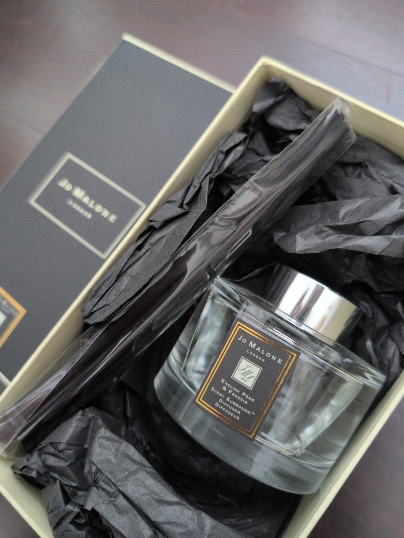 Jo Malone Diffuser (Category: Other Home Decor) located in Singapore. Submitted by m.allure (Listing ID 1408752869, Image 1). Description: - Brand: Jo Malone - Type: Diffuser - Condition: New in packaging - Includes: Reeds - Design: Sleek and elegant - Perfect for: Adding a touch of luxury to your home.