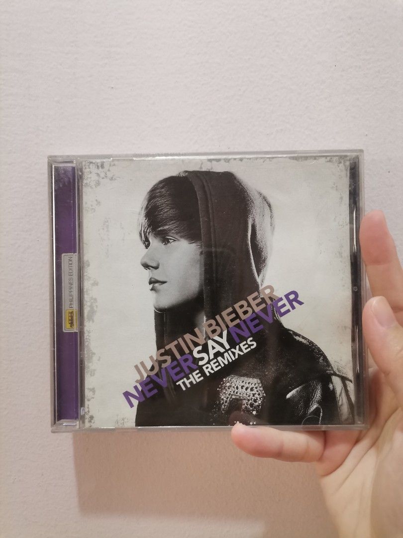 Justin Bieber CD Collection (Category: CDs & DVDs) located in Makati City. Submitted by kookybearsstuff (Listing ID 1408735004, Image 3). Description: Collection of Justin Bieber CDs. Includes "My Worlds The Collection" and "Never Say Never The Remixes". The receipt from SM Mall of Asia is included, dated March 27, 2011. The CDs are in their original cases..