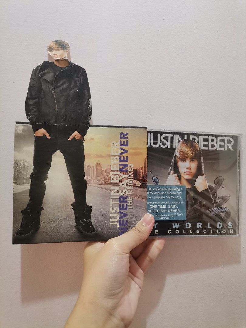 Justin Bieber CD Collection (Category: CDs & DVDs) located in Makati City. Submitted by kookybearsstuff (Listing ID 1408735004, Image 1). Description: Collection of Justin Bieber CDs. Includes "My Worlds The Collection" and "Never Say Never The Remixes". The receipt from SM Mall of Asia is included, dated March 27, 2011. The CDs are in their original cases..