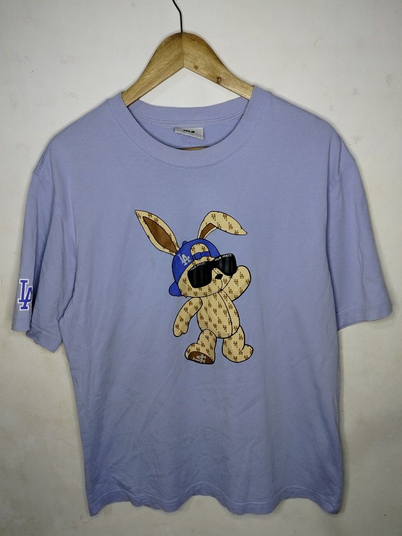LA Party MLB Teeshirt (Category: Tshirts & Polo Shirts ) located in Tacurong. Submitted by jumarvelous (Listing ID 1408794978, Image 1). Description: Excellent Condition No Issue, Need wash size M on tag, best fit M Dimes: 21x27 Condition: 9/10.