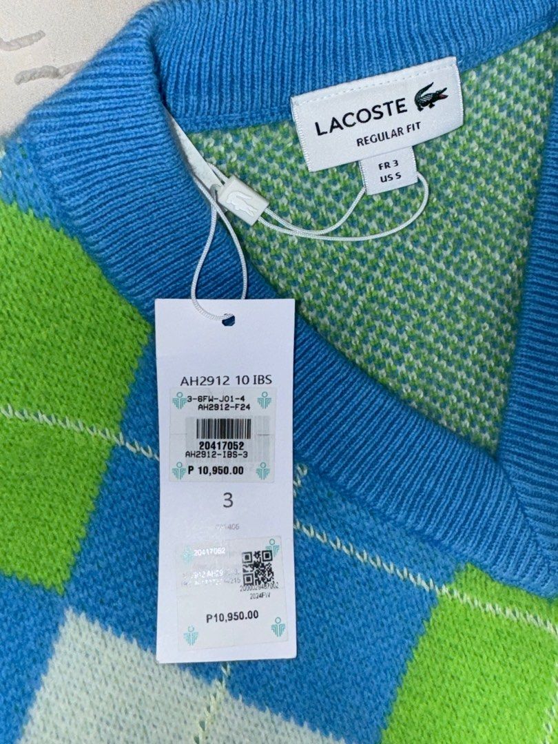 Lacoste Argyle Vest (Category: Vests) located in Manila. Submitted by ugcmeech (Listing ID 1408830216, Image 2). Description: - Authentic Lacoste vest - Argyle pattern - V-neck design - Mens Size 3 (US S) - Includes original tags and packaging - Used once for a photo.
