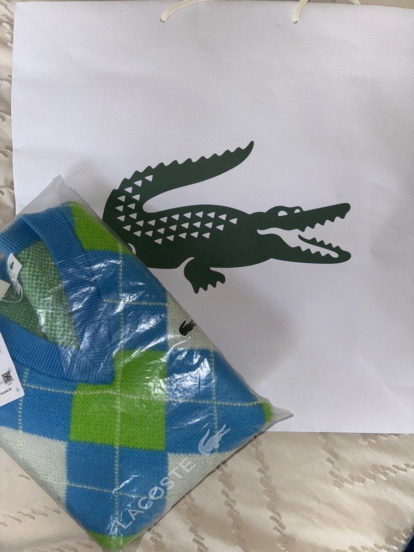 Lacoste Argyle Vest (Category: Vests) located in Manila. Submitted by ugcmeech (Listing ID 1408830216, Image 3). Description: - Authentic Lacoste vest - Argyle pattern - V-neck design - Mens Size 3 (US S) - Includes original tags and packaging - Used once for a photo.