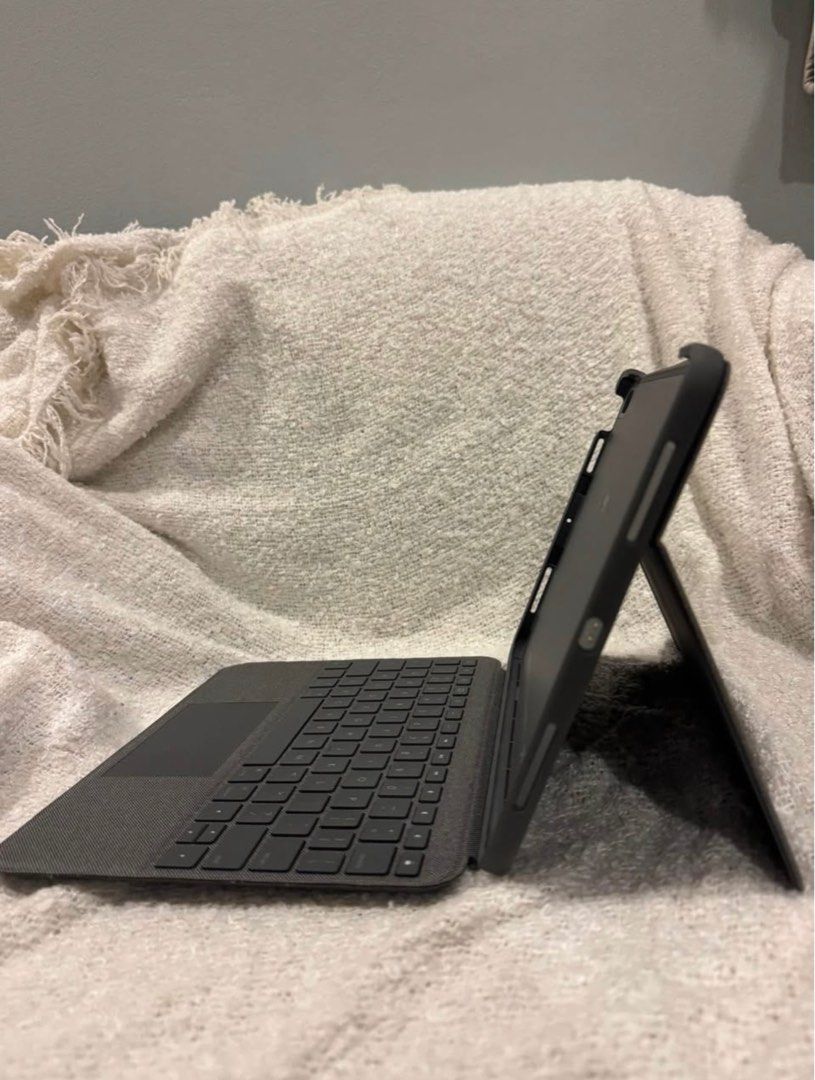Logitech Keyboard with Trackpad for iPad Air 11-inch (Category: Computer Keyboard) located in Quezon City. Submitted by smiskee (Listing ID 1408805455, Image 2). Description: Brand: Logitech Compatibility: 11-inch iPad Air (4th & 5th Gen) Color: Oxford Grey Condition: Lightly used.