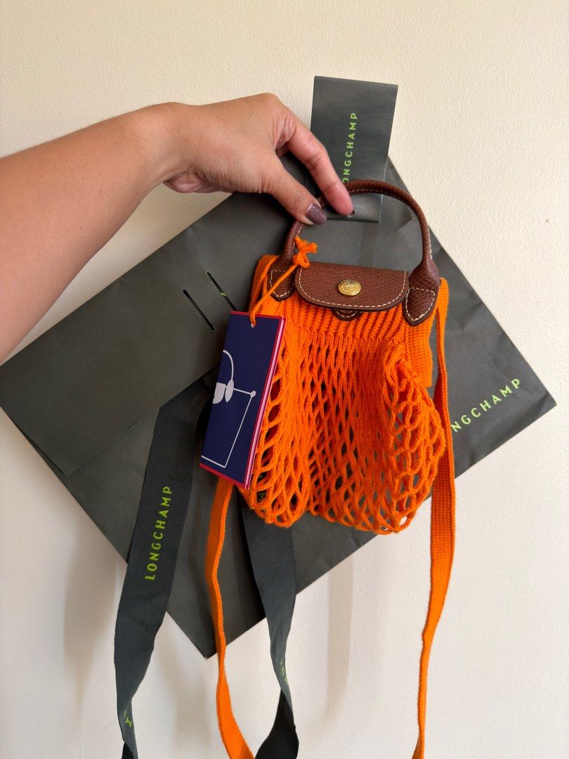 Longchamp Le Pliage Filet Bag (Category: Luxury Bags & Wallets) located in Cebu City. Submitted by worthitsizzums (Listing ID 1408717304, Image 1). Description: Used once on a beach wedding Color phased out LAST PRICE!!! .