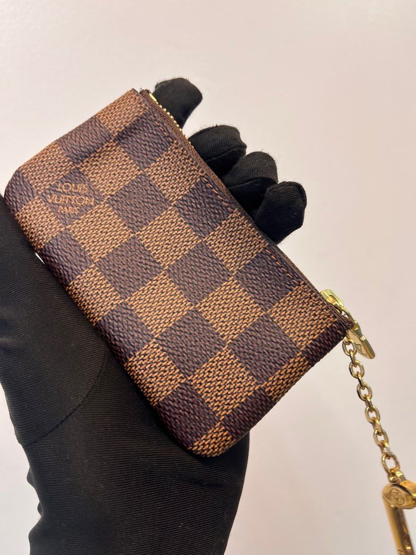 LOUIS VUITTON Damier Ebene Canvas Key Pouch (Category: Luxury Bags & Wallets) located in Taguig. Submitted by shoppersluxe2394 (Listing ID 1408826004, Image 1). Description: .