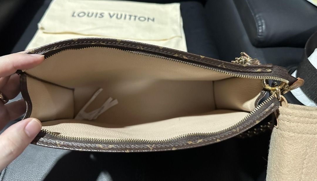 Louis Vuitton Monogram Pochette Felicie (Category: Luxury Bags & Wallets) located in Mandaluyong City. Submitted by peanutsola (Listing ID 1408709016, Image 3). Description: - Authentic Louis Vuitton Pochette Felicie - Monogram canvas - Gold-tone chain strap - Removable interior pocket - Includes dust bag - Classic LV monogram pattern - Charm attached - Perfect for everyday or special occasions Like New.