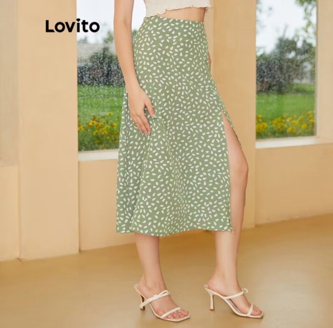 Lovito Floral Slit Midi Skirt (Category: Skirts) located in Manila. Submitted by _thriftatbp (Listing ID 1408806529, Image 2). Description: - Features a floral print and a slit on the side - High waist design and is made of a lightweight fabric - Suitable for casual wear and can be paired with various tops.