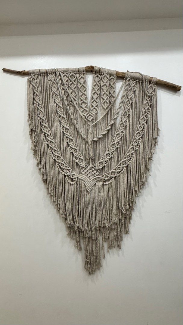 Macrame Wall Hanging Decor/ Boho Home Decor (Category: Wall Decor) located in Iriga City. Submitted by missbeetee (Listing ID 1408872337, Image 1). Description: - Handmade macrame wall hanging - Natural, neutral color palette - Intricate knotting design RFS: Renovating Price is negotiable :).