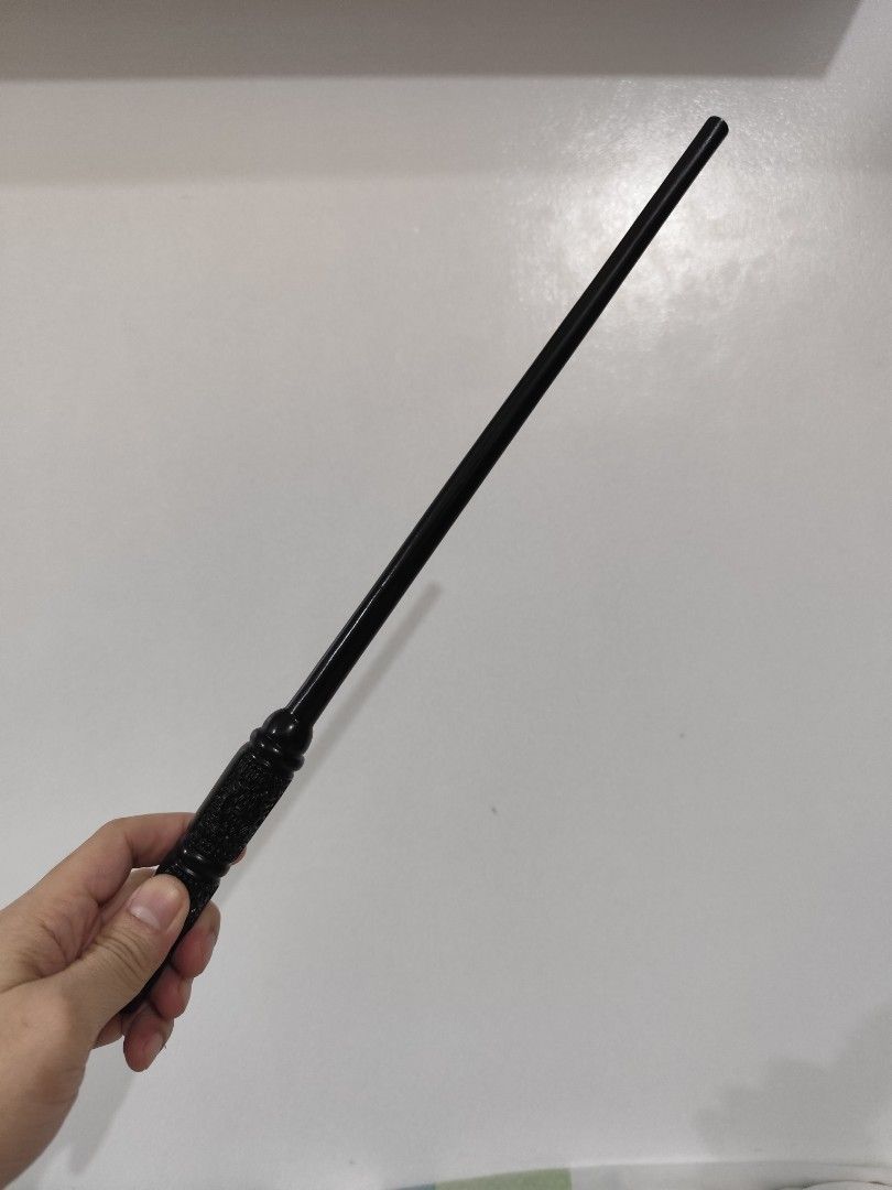 HARRY POTTER WAND - Magic Wand with Box (Category: Western Merchandise) located in Taguig. Submitted by emmanskie10 (Listing ID 1408740673, Image 2). Description: - Black magic wand - Harry Potter Wand - Detailed handle - Includes box and charging cable - used only once - Perfect for cosplay or gifts - Great for Harry Potter fans.