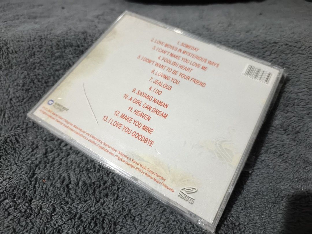 Nina Videoke CD (Category: CDs & DVDs) located in Quezon City. Submitted by kevinfuentes0219 (Listing ID 1408714684, Image 2). Description: CD features Nina's Videoke tracks. The CD includes songs like "Someday", "Love Moves in Mysterious Ways", and "I Can't Make You Love Me". It also includes other tracks such as "Foolish Heart", "I Don't Want to Be Your Friend", "Loving You", "Jealous", "Sayang Naman", "A Girl Can Dream", "Heaven", "Make You Mi