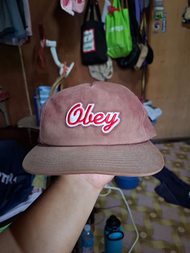 Obey Cap (Category: Caps & Hats) located in Victorias. Submitted by doc_keith (Listing ID 1408699955, Image 1). Description: - Obey brown cap - Features Obey logo - Snapback closure - Material: 100% cotton - One size fits all - Made in Vietnam.