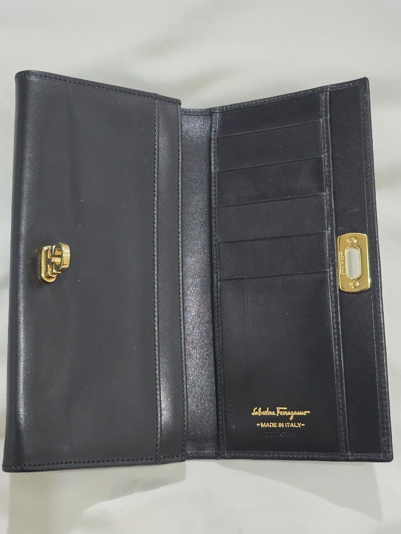 Original Salvatore Ferragamo Long Wallet (Category: Luxury Bags & Wallets) located in Cavite. Submitted by everythingjapan (Listing ID 1408876253, Image 3). Description: original ferragamo wallet almost new BUT WITH FLAWS: sticky coin pocket, cannot use. hence selling very low the wallet can still be used as is without the coin compartment or if u can clean it out or bring to a bag spa for cleaning. no inclusions 4 card slots 1 open pockets bill 