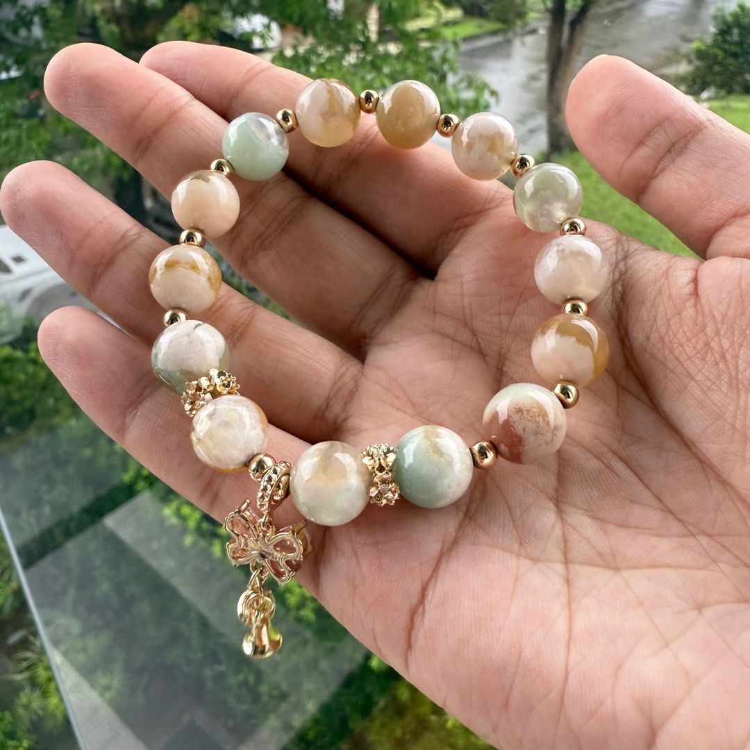 Pink and Teal Sakura Agate Charm Bracelet (Category: Bracelets) located in Las Pinas. Submitted by bubustings_ (Listing ID 1408748158, Image 1). Description: - handmade - 10mm beads, 16cm size - super HQ quality.