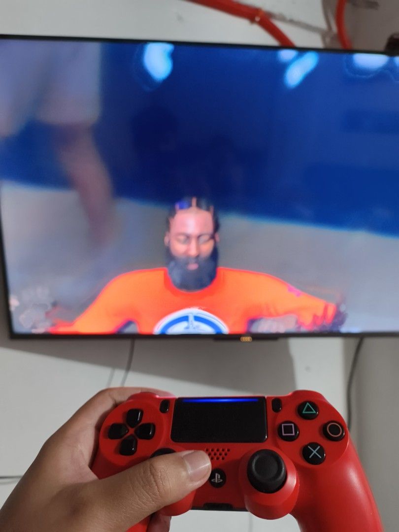 PlayStation 4 Console with Games and Controllers (Category: PlayStation) located in Quezon City. Submitted by hghthrft (Listing ID 1408739444, Image 3). Description: - PlayStation 4 console included - Two controllers: white and red - Games: NBA 2K25, It Takes Two, Thief - All items in good working condition.