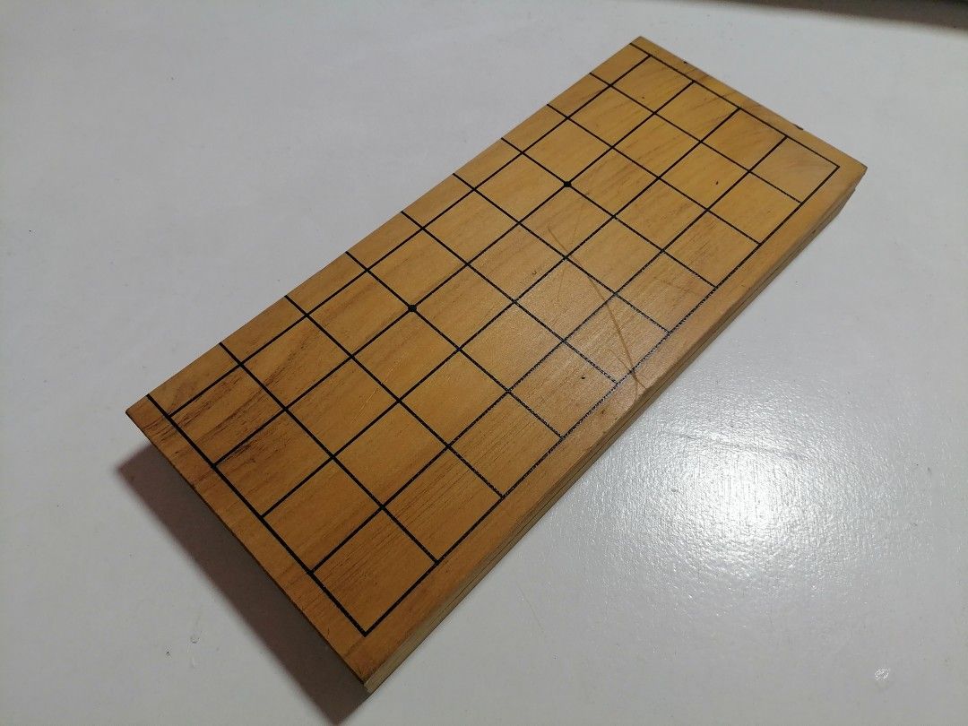 SHOGI BOARD (Japanese Chess) (Category: Board Games & Puzzles) located in San Mateo. Submitted by arrowscrap_delight (Listing ID 1408741530, Image 1). Description: SHOGI BOARD (Japanese Chess ) Good Condition Wood Material Dimensions : 30.5cm x 26.5cm Minor Issue: Dents, Ink Mark & Light Scrathes (last 3 photos) 120 + SF.