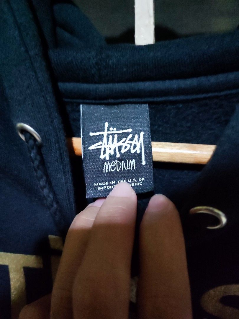 Stussy Hoodie Medium Black (Category: Hoodies) located in Antipolo. Submitted by thriftedjames (Listing ID 1408810455, Image 2). Description: - Black Stussy hoodie - Features Stussy logo and "N4" in gold - Size: Medium - Material: 80% cotton, 20% polyester - Includes "Have a Good Vibe" tag - Made in U.S.A. (imported fabric).