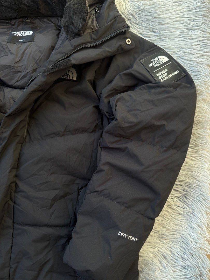 The North Face Long Down Jacket Black (Category: Coats, Jackets and Outerwear) located in Legazpi City. Submitted by tiny0509 (Listing ID 1408761119, Image 2). Description: Black The North Face long down jacket. Features a hood, DryVent technology, and RDS (Responsible Down Standard) certification. Size S/SG. Includes a zip closure and multiple pockets. Perfect for cold weather. Made with 100% polyester. 22x40 dimention may best fit to large.