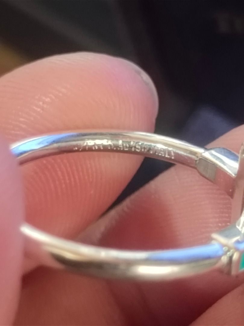 Tiffany & Co. T-Ring with Turquoise and Diamonds (Category: Rings) located in Legazpi City. Submitted by roxy420 (Listing ID 1408744827, Image 3). Description: Tiffany & Co. T-ring. Features a T-design with turquoise and diamond accents. The ring is marked "T & Co. Au750 Italy". Comes with the Tiffany & Co. box. A stylish and elegant piece perfect for everyday wear or special occasions..