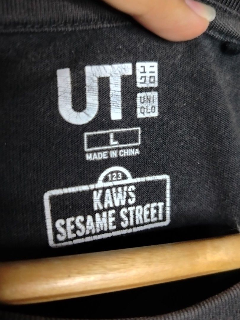 Uniqlo x Kaws Pocket Tee (Category: Tshirts & Polo Shirts ) located in Tacurong. Submitted by jumarvelous (Listing ID 1408792708, Image 3). Description: Excellent Condition No Issue, Needs wash size L on tag, best fit M-L Dimes: 21.5x28 Condition: 10/10.
