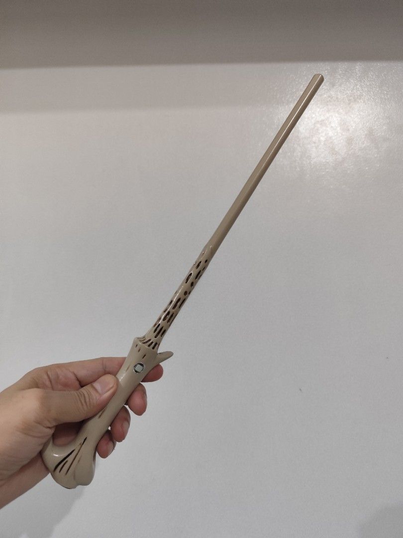 Voldemort (Harry Potter) - Magic Wand with Box (Category: Western Merchandise) located in Taguig. Submitted by emmanskie10 (Listing ID 1408740922, Image 2). Description: - Magic wand with original box and charging cable. - Features a unique design. - Made of a light-colored material. - Ideal for aspiring wizards and Harry Potter enthusiasts..