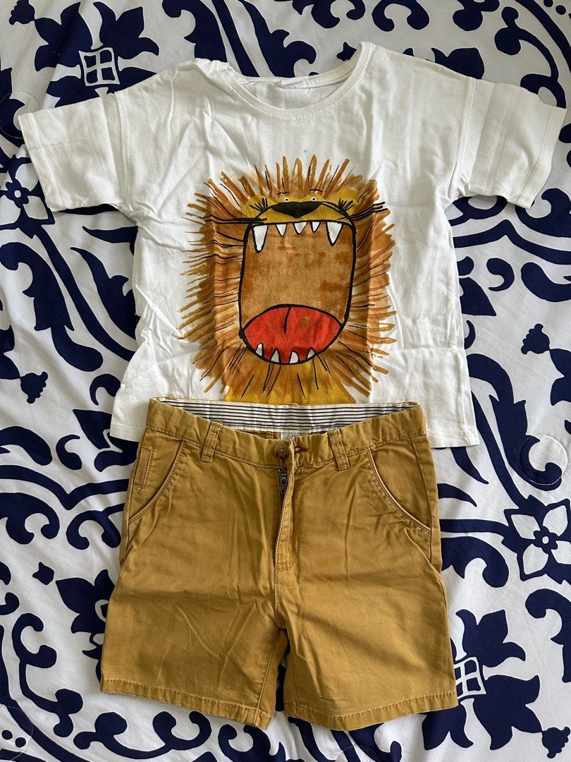 Zara Lion Graphic Tee and Shorts Set (Category: Babies & Kids Fashion) located in Baybay. Submitted by styleonpoint (Listing ID 1408706695, Image 1). Description: - Adorable kids' outfit! - Includes a white Zara t-shirt with a fun lion graphic. - T-shirt size: 3-4 years. - Includes mustard-colored shorts. - Shorts size: 4-5 years. - Made in Bangladesh. - Perfect for everyday wear..