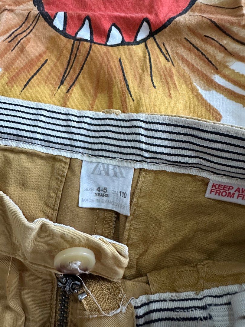 Zara Lion Graphic Tee and Shorts Set (Category: Babies & Kids Fashion) located in Baybay. Submitted by styleonpoint (Listing ID 1408706695, Image 3). Description: - Adorable kids' outfit! - Includes a white Zara t-shirt with a fun lion graphic. - T-shirt size: 3-4 years. - Includes mustard-colored shorts. - Shorts size: 4-5 years. - Made in Bangladesh. - Perfect for everyday wear..