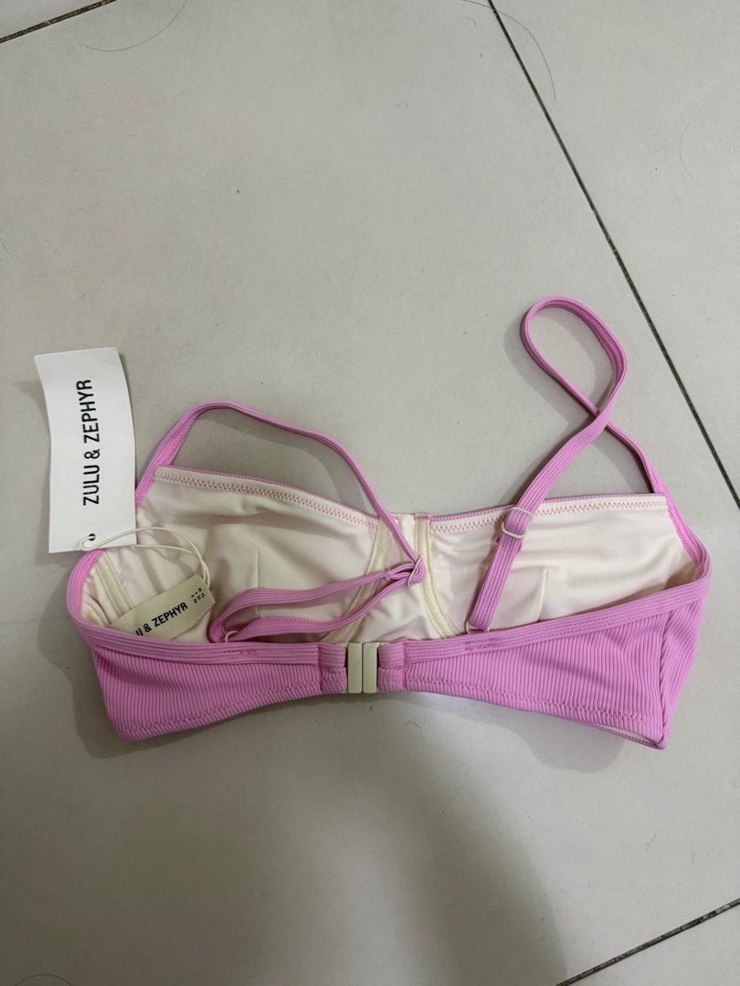 Zulu & Zephyr Pink Bikini Top (Category: Bikinis & Swimsuits) located in Manila. Submitted by itsr2 (Listing ID 1408772316, Image 3). Description: - Zulu & Zephyr pink bikini top - Ribbed texture - Adjustable straps - Clasp closure at back - Size: AU 8 / US 4 / EU 36 - Stylish swimwear.