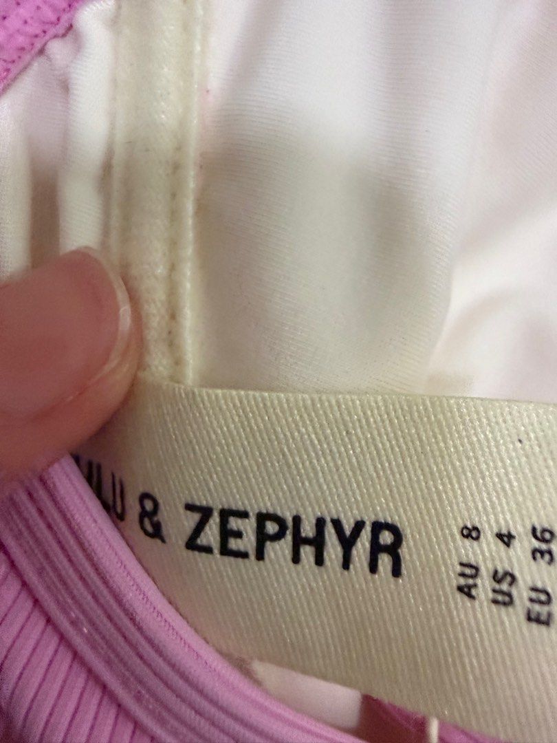 Zulu & Zephyr Pink Bikini Top (Category: Bikinis & Swimsuits) located in Manila. Submitted by itsr2 (Listing ID 1408772316, Image 2). Description: - Zulu & Zephyr pink bikini top - Ribbed texture - Adjustable straps - Clasp closure at back - Size: AU 8 / US 4 / EU 36 - Stylish swimwear.