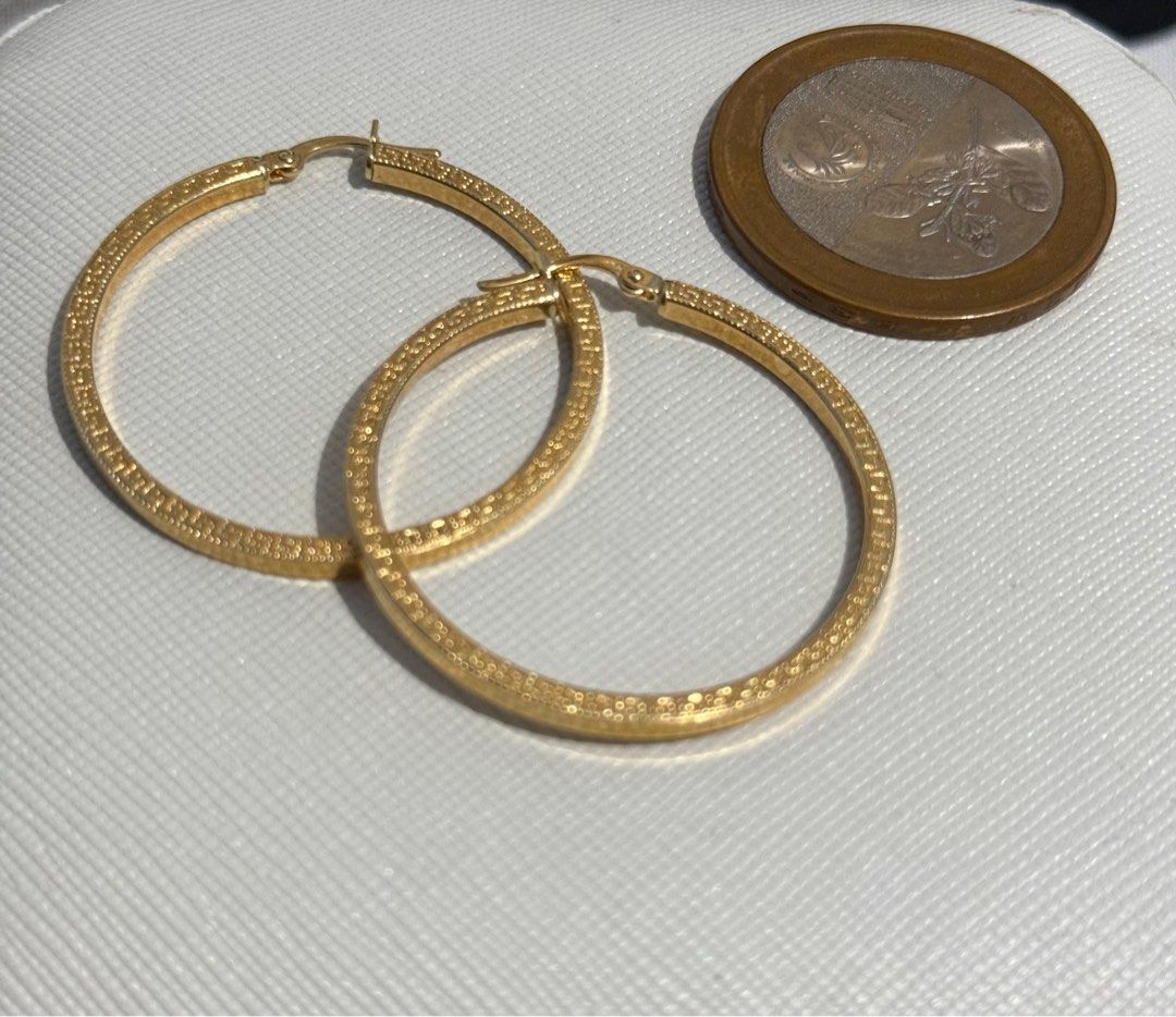 18K gold loop earrings (Category: Earrings) located in Iloilo. Submitted by cheenaaa (Listing ID 1350645408, Image 1). Description: 18K Saudi gold 2.6 grams Fend! design loop earrings .