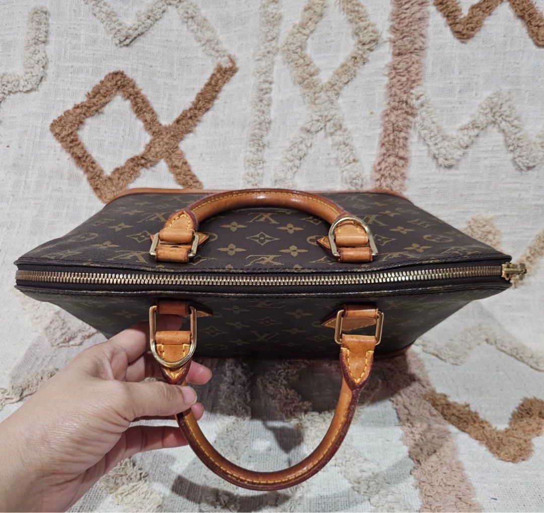 Autentic LV Alma (Category: Luxury Bags & Wallets) located in Muntinlupa City. Submitted by Jessa (Listing ID 1350623084, Image 3). Description: L.V Alma PM Date Code: TH 0978 Made in France 🔸️The monogram canvas is clean, and in good condition, shows normal signs of usage. Handles and bottom vachetta turn honey patina with watermarks, some stains, light scratches but there's no crack, and no holes on the corners. The handles has no crack. 🔸️ h