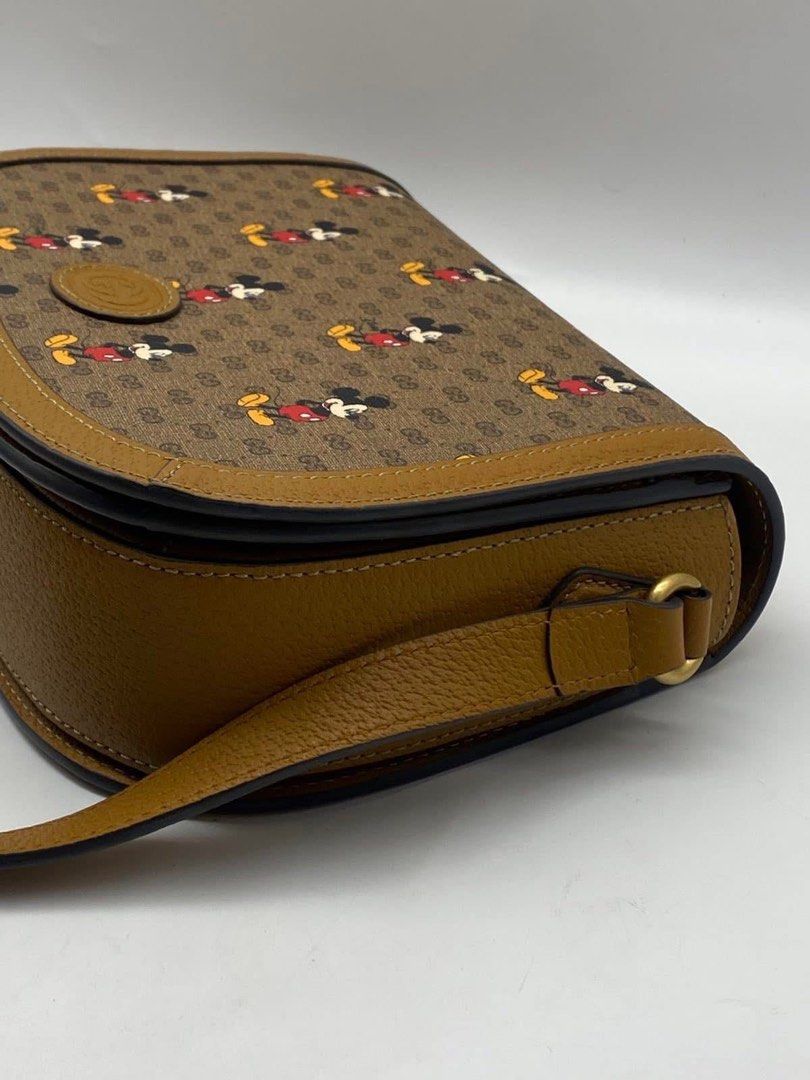 Authentic Gucci (Category: Luxury Bags & Wallets) located in Manila. Submitted by chloe_luxuries (Listing ID 1350689840, Image 2). Description: Guaranteed original Disney X Gucci Flap crossbody bag Still in excellent condition No inclusion bag only Pm for more details .