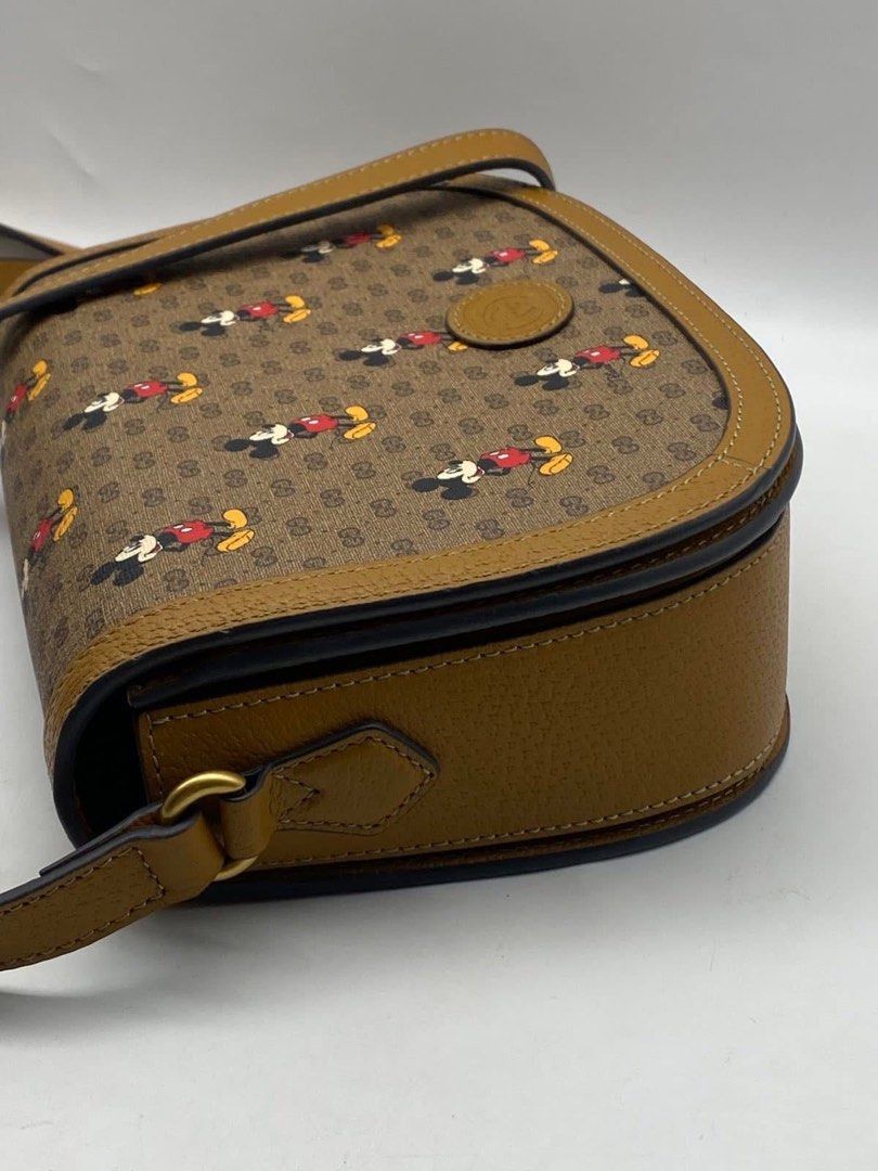 Authentic Gucci (Category: Luxury Bags & Wallets) located in Manila. Submitted by chloe_luxuries (Listing ID 1350689840, Image 3). Description: Guaranteed original Disney X Gucci Flap crossbody bag Still in excellent condition No inclusion bag only Pm for more details .