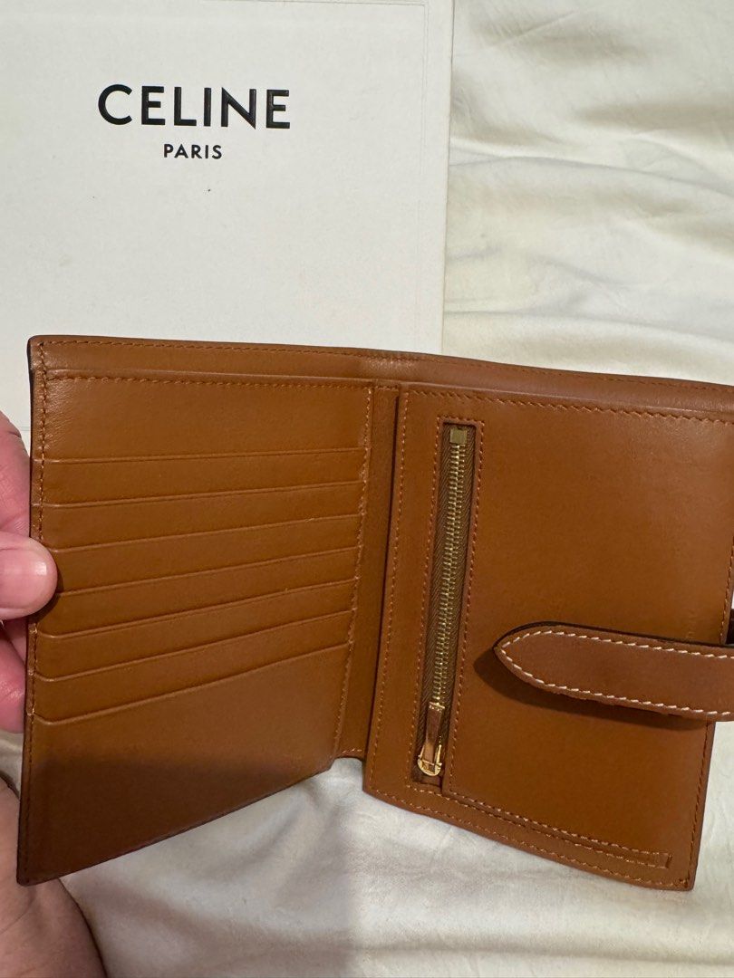 Authentic pre loved celine triomphe canvas compact wallet (Category: Luxury Bags & Wallets) located in Manila. Submitted by pandas_closet (Listing ID 1350696958, Image 2). Description: Authentic and good as new Comes with box Some minor rubs As is No dirt inside.