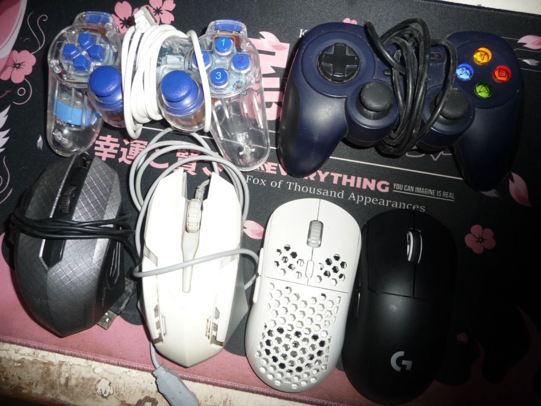 CONTROLLERS & MOUSES (OPEN FOR TRADE) (Category: Controllers) located in Los Banos. Submitted by justinthegreat53 (Listing ID 1350631192, Image 1). Description: Available for trade (Overpay) Usb Controller (with issue) - 150 Logitech F310 Controller (with issue) - 350 Usb Mouse (scroll wheel issue) - 100 Inplay Mouse - 150 Rakk dasig wireless - 900 Logitech G Pro X Superlight (New but no box) - 3500.