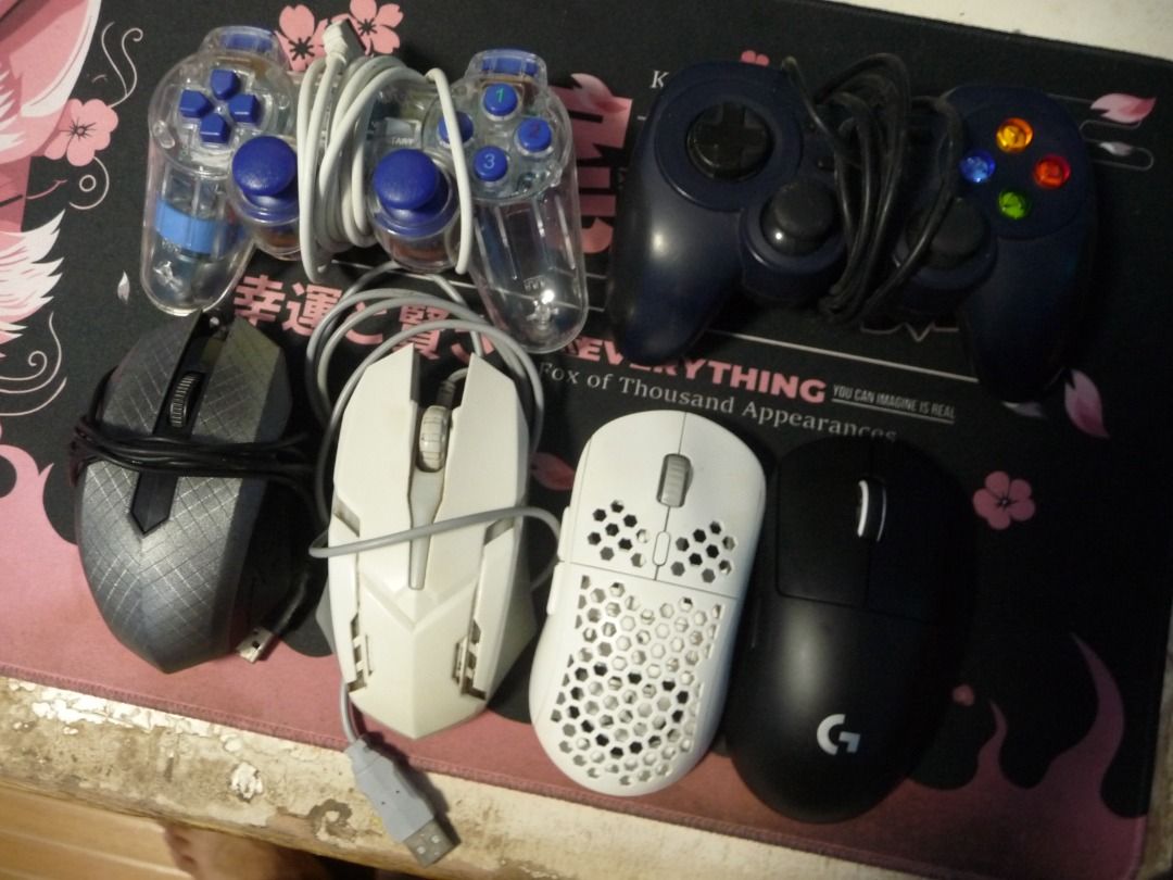 CONTROLLERS & MOUSES (OPEN FOR TRADE) (Category: Controllers) located in Los Banos. Submitted by justinthegreat53 (Listing ID 1350631192, Image 2). Description: Available for trade (Overpay) Usb Controller (with issue) - 150 Logitech F310 Controller (with issue) - 350 Usb Mouse (scroll wheel issue) - 100 Inplay Mouse - 150 Rakk dasig wireless - 900 Logitech G Pro X Superlight (New but no box) - 3500.