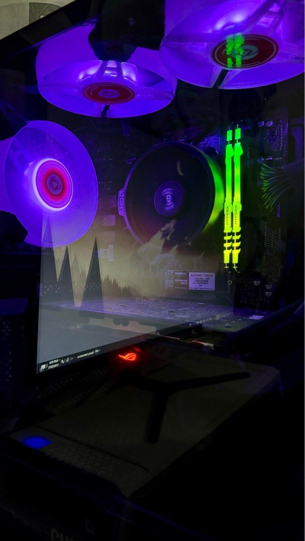Gaming PC Setup (System Unit + Peripherals) (Category: Desktops) located in Pila. Submitted by kingtapia22 (Listing ID 1350605948, Image 2). Description: For Sale Personal Gaming PC Setup (System Unit with Peripherals) Running on Windows 10 Pro Plug and Play All working except 1 case fan but is easily replaceable What you see is what you get Key Specs: Processor: Ryzen 3 3200G Motherboard: GIGABYTE B450m S2H V2 GPU: ROG Strix RX570 8gb OC Ram: Hy