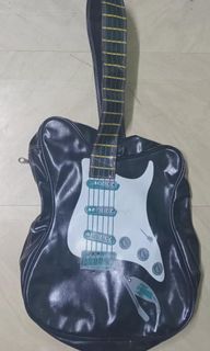 Guitar shaped sling bag