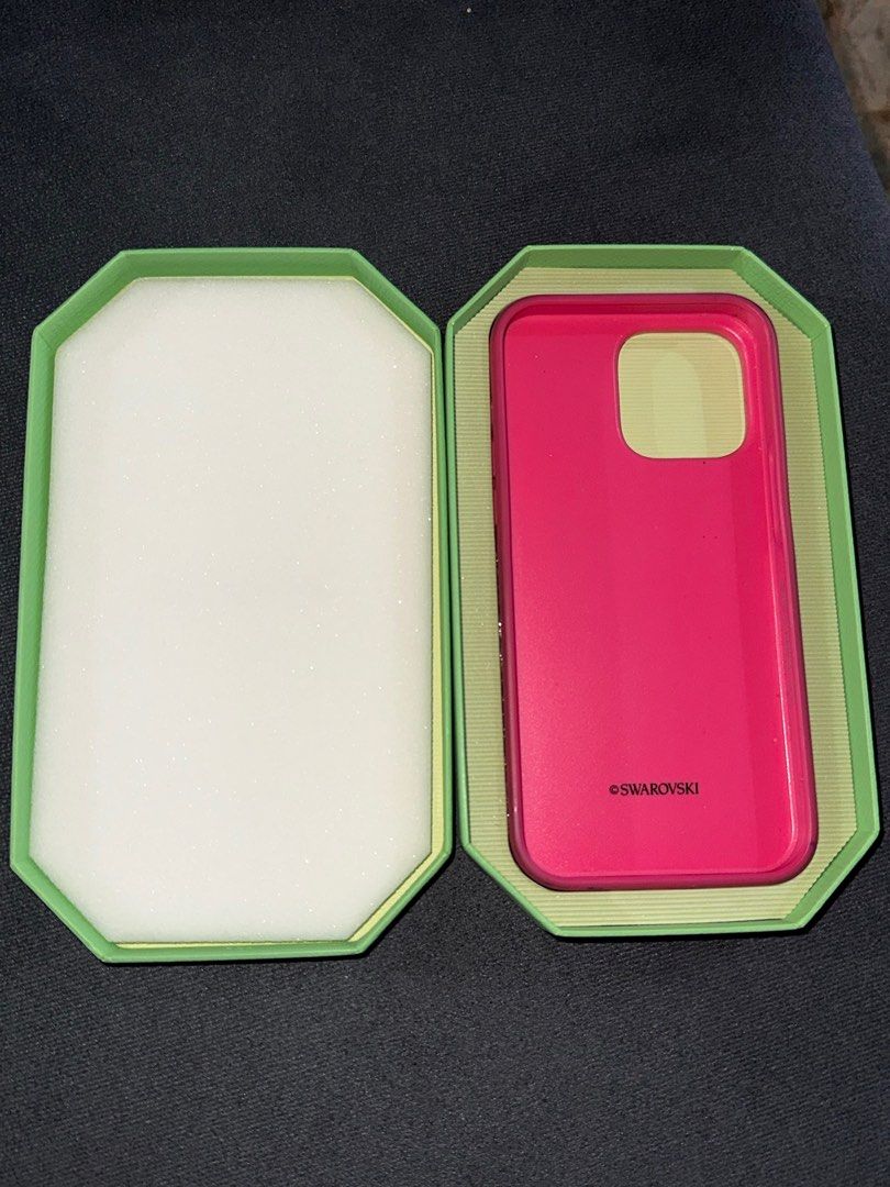 Pink Swarovski IPhone 14 Pro Max Case (Category: Cases & Sleeves) located in Quezon City. Submitted by kendra001 (Listing ID 1350686690, Image 2). Description: Pink Swarovski IPhone 14 Pro Max Case Used twice PM po for more photos Negotiable RFS: nagupgrade na po ng phone.
